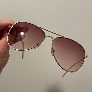Pink glass gold frames sunglasses